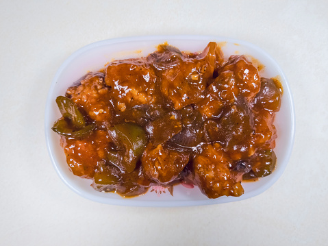 Indian spicy gravy boneless chilli chicken, a Chinese cuisine in closeup