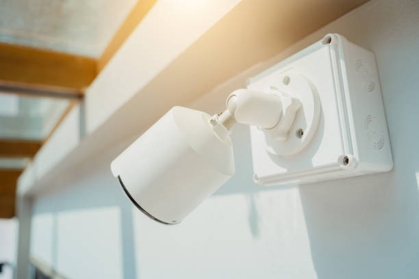 istock Modern CCTV camera on a wall of a residential building 2148569952