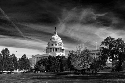 View of Capitol Building with cloud sky in black and white, Washington DC