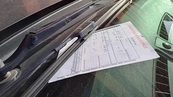 Police report on the windscreen of the car, Local Police Italy.