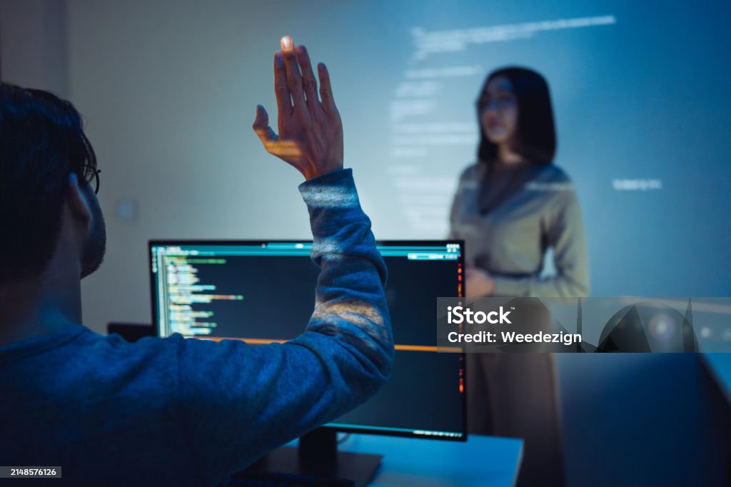Trainee Developer Hand Up To Ask Speaker About Software Coding Project ...