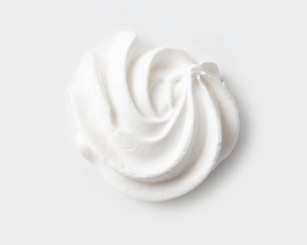istock Closeup of white creamy marshmallow isolated on white background 2148578991