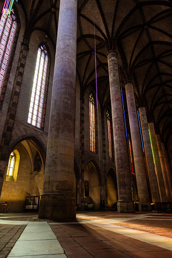Stained glass windows and vaults inside the Church of the Jacobins in Toulouse