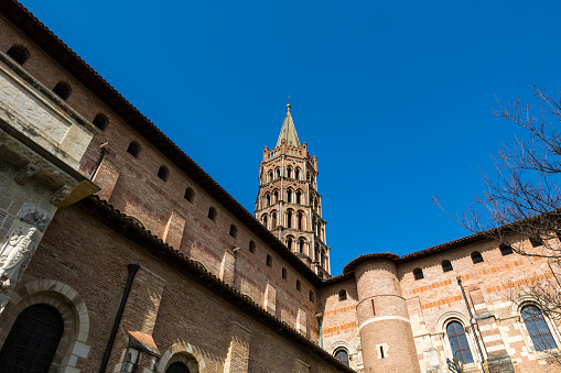 Octagonal bell tower in red bricks of the Basilica of Saint-Sernin in Toulouse