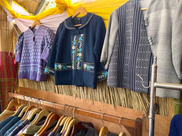 istock Handmade clothes hanging in store for selling 2148585046