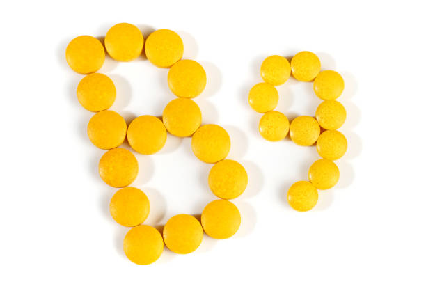 istock Vitamin B Pills isolated - B9 on white background 2148586250