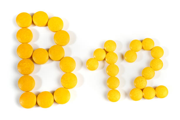 istock Vitamin B Pills isolated - B12 on white background 2148586252