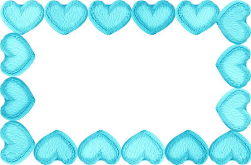 Gorgeous Frame of Arctic Blue Heart Shaped Marshmallow Candies on white background