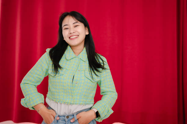 istock portrait asian woman  next to wall 2148589194