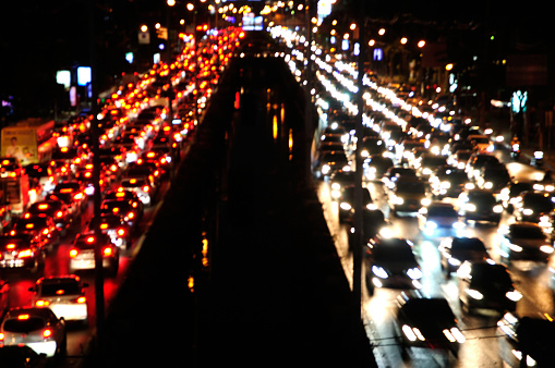 Out-of-focus lights from cars in a traffic jam