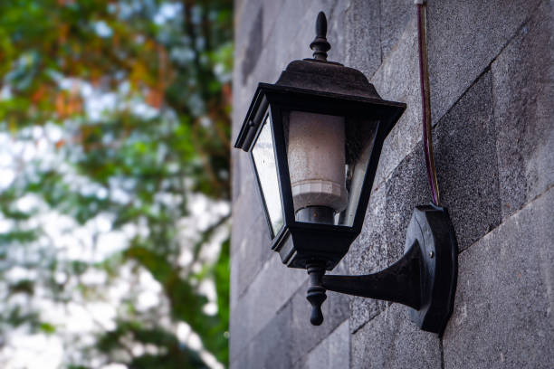 A decorative lamp attached to the outside of the wall
