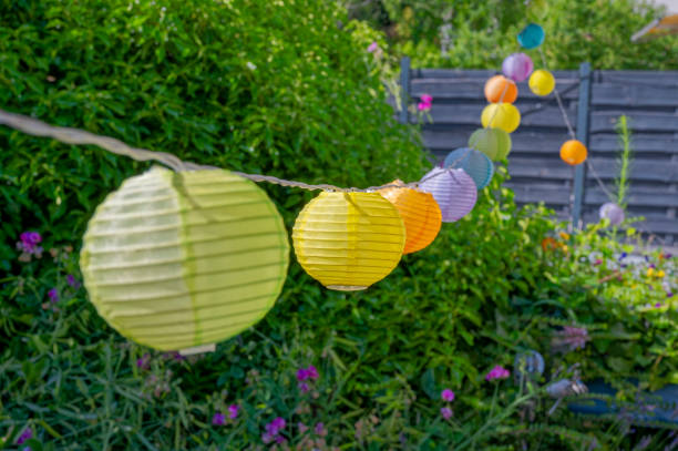 istock Summerly garden scene with colorful lampions. 2148591450