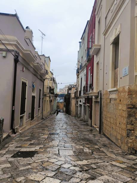 istock Narrow street after the rain 2148594531