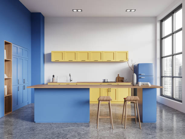 istock Blue and yellow kitchen interior with island 2148595490