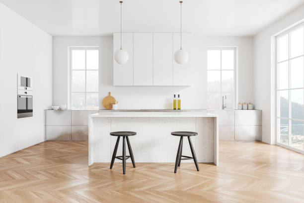 istock Luxury home kitchen interior with bar counter, cooking cabinet and window 2148595682