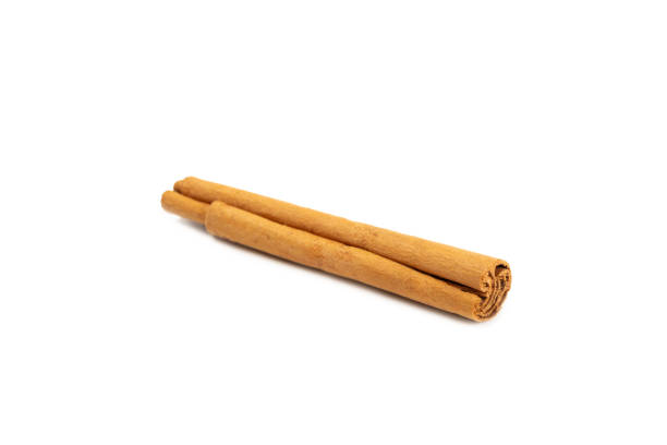 istock Ceylon cinnamon.Cinnamon sticks isolated on white background. Cinnamon roll and powder. Spicy spice for baking, desserts and drinks. Fragrant ground cinnamon. Close-up. Place for text. copy space 2148596667