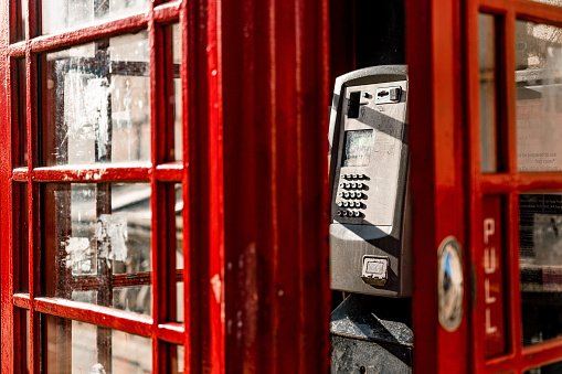 Traditional old style UK red phone box