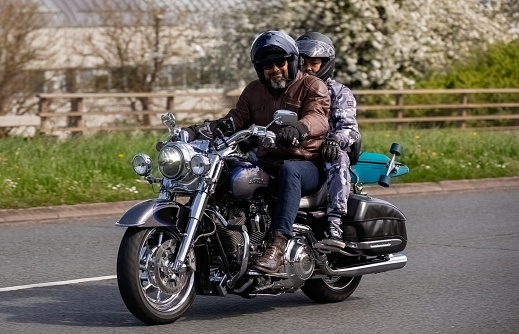 Milton Keynes,UK- Apr 14th 2024: 2008 Harley Davidson flhrse 3 Road King  on a British road
