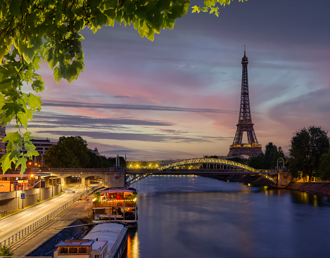 Cityscape of Paris with the view on Eiffel Tower and Pont Rouelle in early morning, France