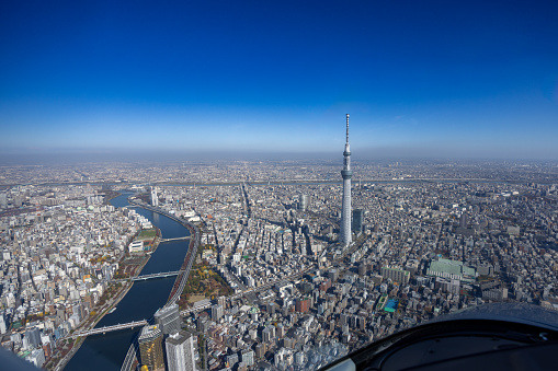 View from helicopter flying over Tokyo, approaching Tokyo Skytree
