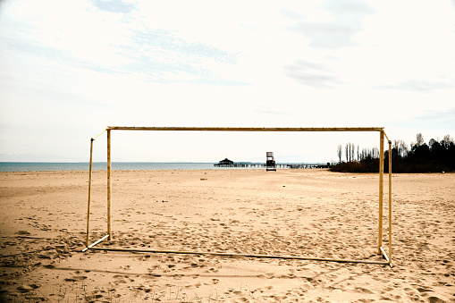 Soccer gate on empty off-season beach on lake Issyk-Kul