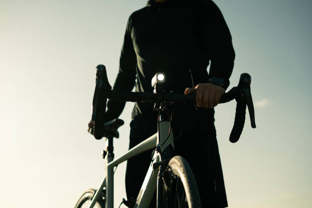istock Close-up Professional cyclist watching the view at sunset 2148605775