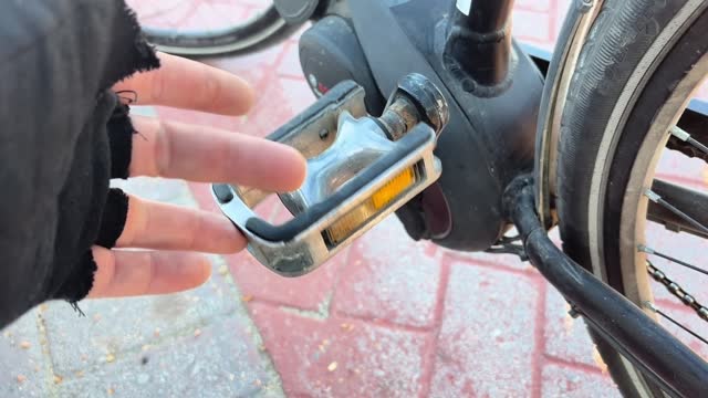 Hands on bicycle pedal control 4k stock video