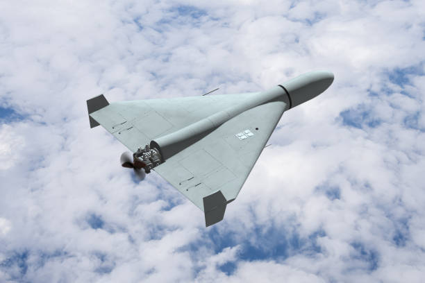 istock Military drone in the sky above the clouds, drone attack. 2148607941