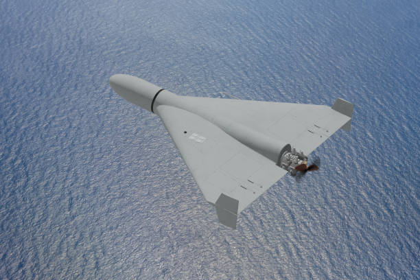 istock Military drone in the sky above the clouds, drone attack. 2148608123