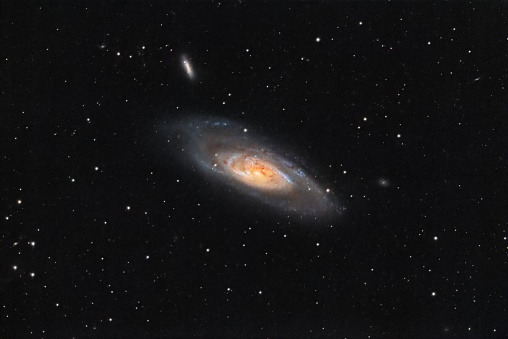Picture of the galaxy Messier 106 captured from my backyard