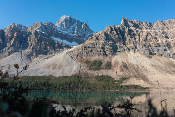 istock Crowfoot Mountain in autumn with snow. 2148613344
