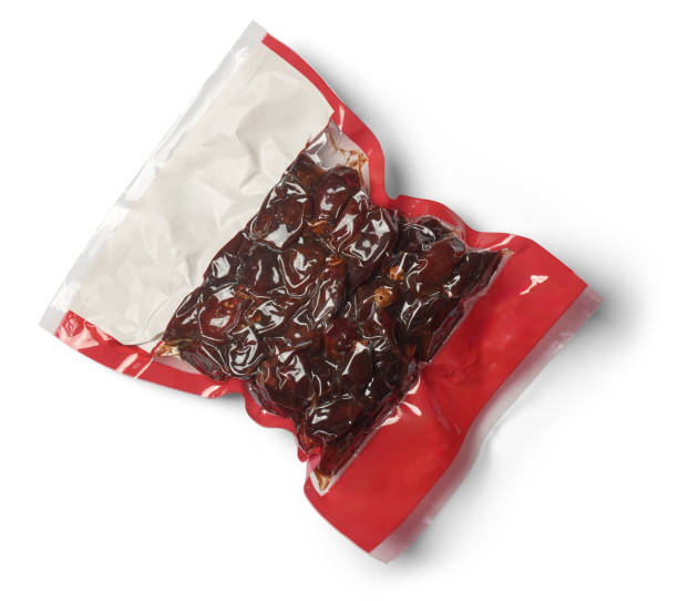 istock vacuum pack of dates isolated white 2148614236
