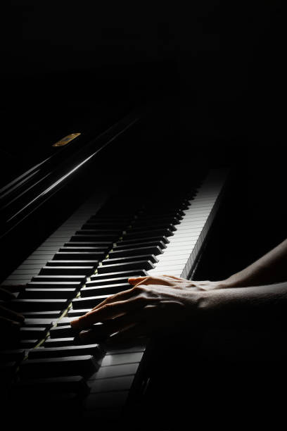istock Piano keys. Pianist hands playing keyboard Piano player 2148617458