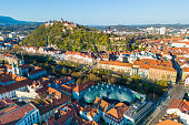 CIty of Graz in Austria on a sunny spring day with the landmark Schloßberg