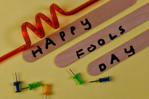 A close-up conceptual photo showcasing the lighthearted spirit of April Fools' Day with a handwritten message