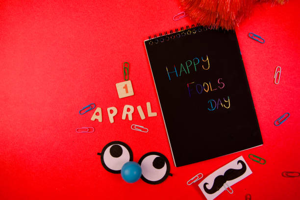 Happy Fools Day concept. Top view, flat lay copy space