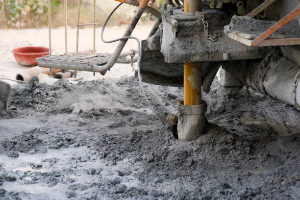 istock Asphalting works in the borewell drilling machine site 2148621111