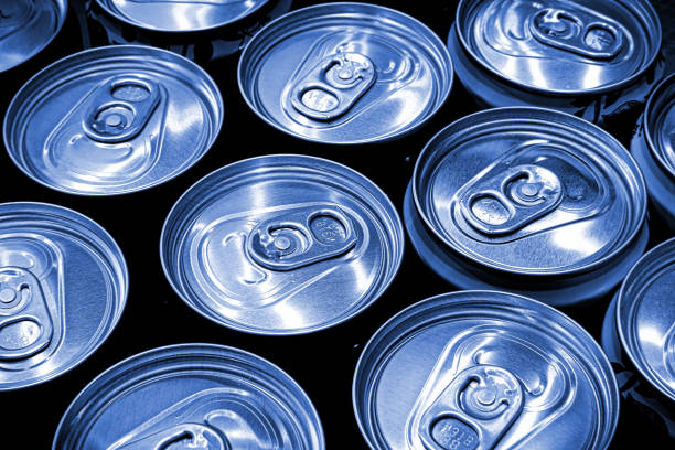 istock Lots aluminum soda or beer cans as background. Blue tone image. 2148621957