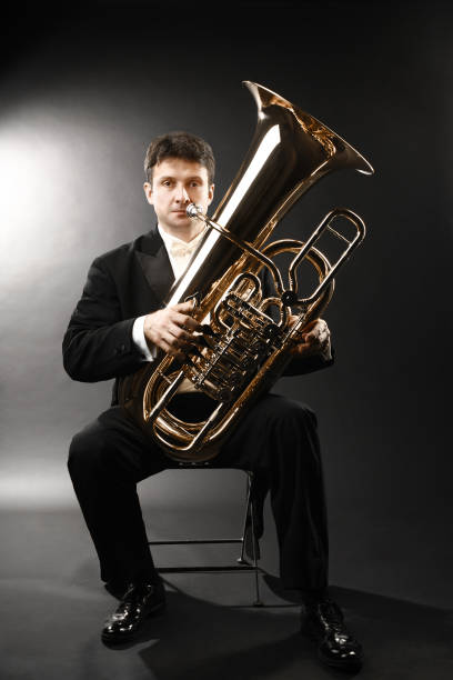 istock Tuba player brass instrument. Classical musician portrait 2148622388