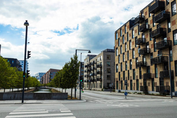 istock promenade with trees and river between building 2148623297