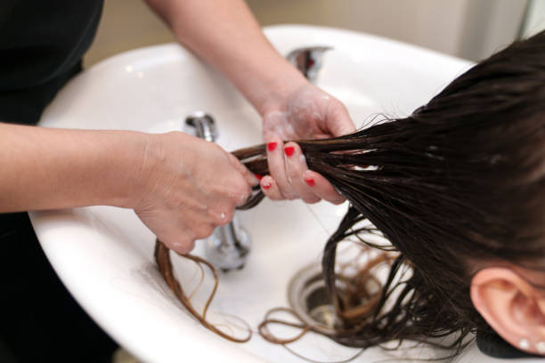 istock Expert Applying Stem Cell Treatment for Hair Revitalization 2148625726