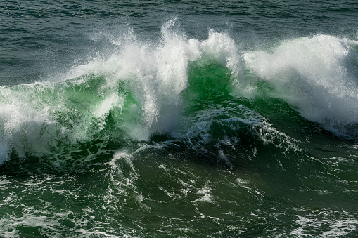 Wide view of ocean waves crashing along the Northern California Coast.

Taken in Santa Cruz, California, USA