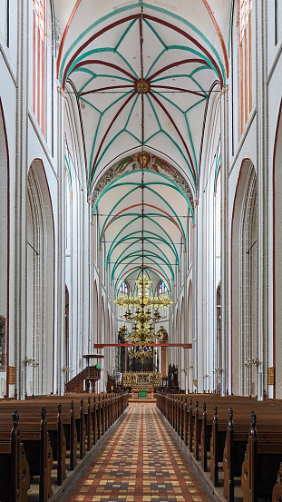Schwerin, Germany - October 21, 2016: Interior of Schwerin Cathedral. The cathedral dedicated to the Virgin Mary and Saint John the Evangelist was founded in the late 12th century. It is now the seat of the Bishop of the Evangelical Lutheran Church of Mecklenburg.