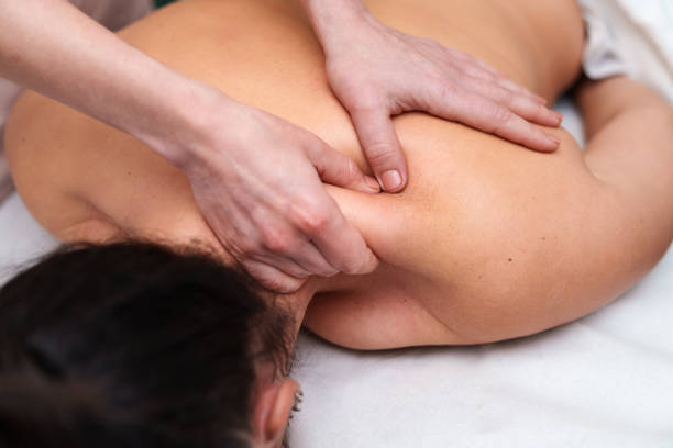 istock Deep Tissue Massage on Female Client by a Professional Therapist 2148626849