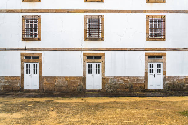 Old house wall with cracked bricks in Porto