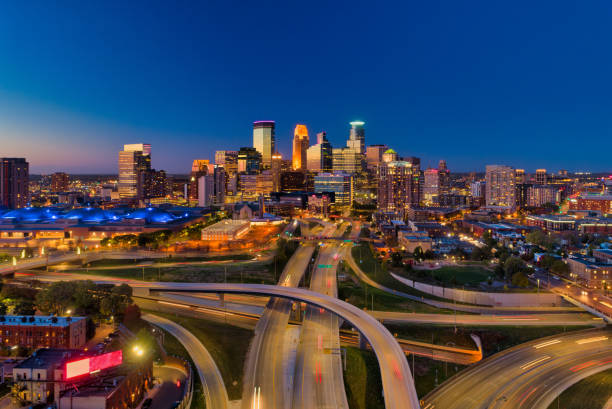 Minneapolis Downtown Skyline Aerial At Dusk With Sunset Reflection