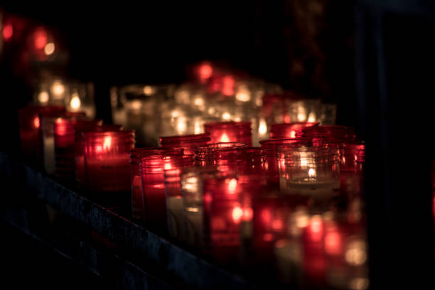 istock Offering candles in a Catholic church 2148629602