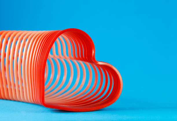 istock Journey of colorful heart shaped plastic spring 2148630515