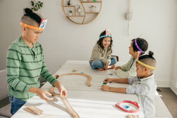 istock Grandmother playing game board with grandkids 2148632231