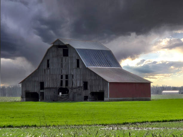 istock Old Wooden Barn With Storm Clouds 2148633018